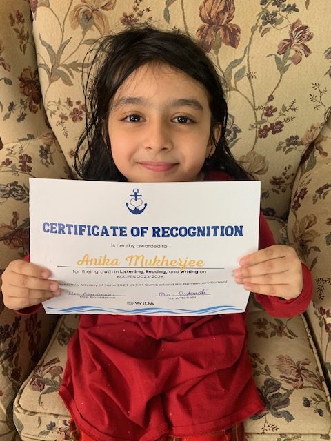 Student smiling with certificate