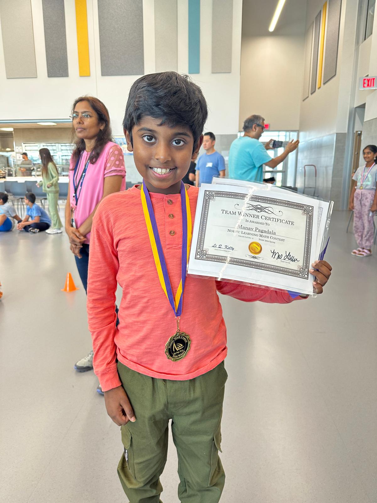 Student smiling with certificate